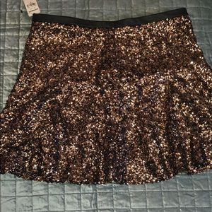 Sequence gold fluted hem skirt